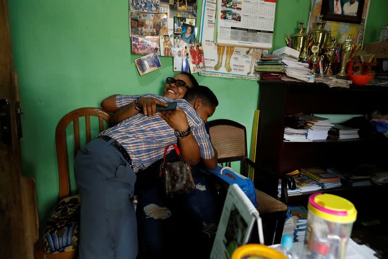 The Wider Image: Nigeria's female bouncers show their strength fighting stereotypes