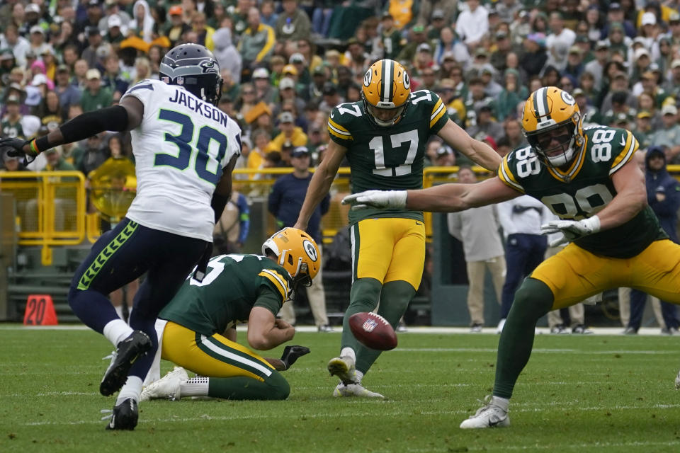 Green Bay Packers place-kicker Anders Carlson (17) kicks a 43-yard field goal in the first half of a preseason NFL football game against the Seattle Seahawks, Saturday, Aug. 26, 2023, in Green Bay, Wis. (AP Photo/Kiichiro Sato)