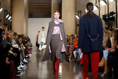 Models present creations at the Victoria Beckham show during London Fashion Week Women's A/W19 in London, Britain February 17, 2019. REUTERS/Henry Nicholls