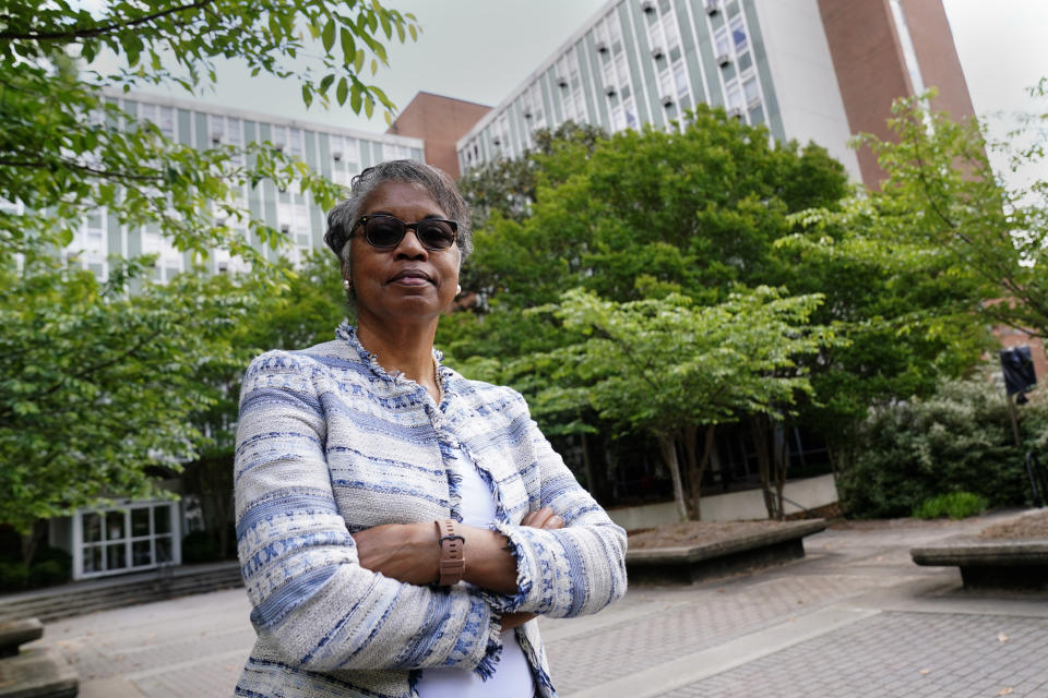 Hattie Whitehead Thomas poses for a portrait on the campus of the University of Georgia in Athens, Ga., on Thursday, May 6, 2021, where a Black neighborhood was razed in the 1960's to make room for dorms. The 72-year-old Athens resident grew up in the destroyed Linnentown neighborhood. “UGA has got to do more. It’s got to come to the table and acknowledge what it did,” she says. (AP Photo/John Bazemore)