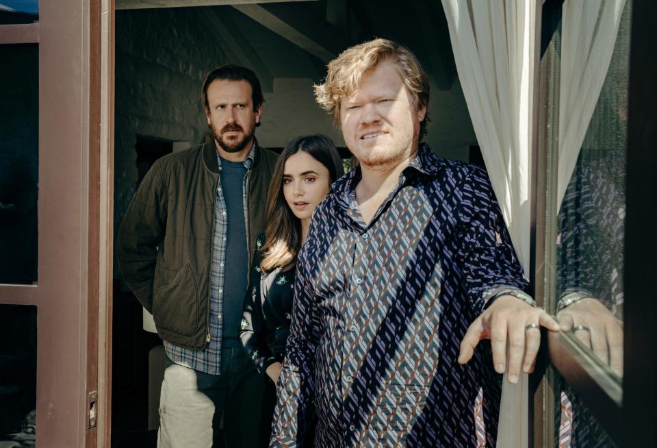 Jason Segel (from left) interrupts a wealthy couple (Lily Collins and Jesse Plemons) on a getaway in &quot;Windfall.&quot;