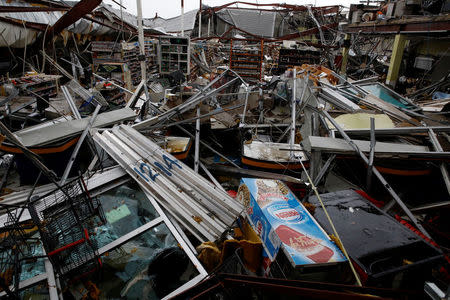 Damages are seen in a supermarket after the area was hit by Hurricane Maria in Guayama, Puerto Rico September 20, 2017. REUTERS/Carlos Garcia Rawlins