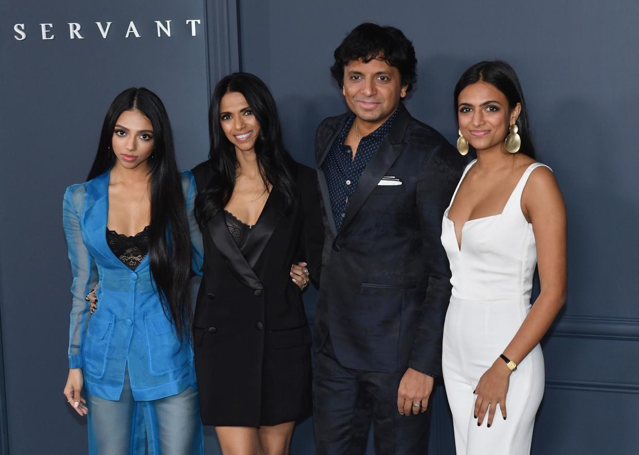 US filmmaker M. Night Shyamalan, his wife Bhavna Vaswani (2L) and guests arrive for Apple TV+ premiere of "Servant" at BAM Howard Gilman Opera House in Brooklyn, New York on November 19, 2019. (Photo by ANGELA WEISS / AFP) (Photo by ANGELA WEISS/AFP via Getty Images)