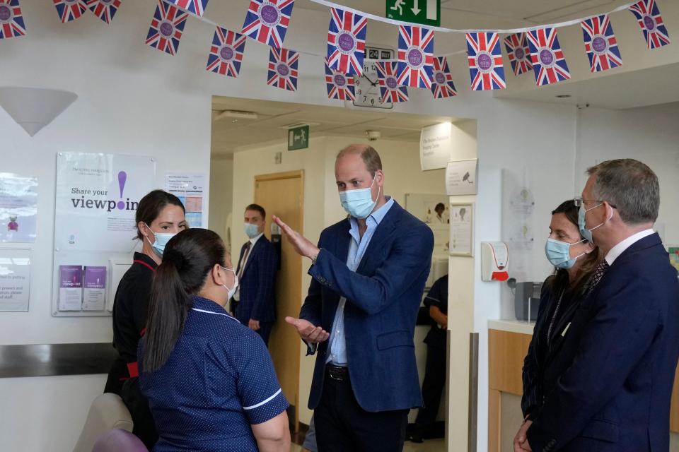 Prince William speaks with members of staff during his visit to The Royal Marsden hospital, which treated Dame Deborah, in May 2022. (Getty Images)