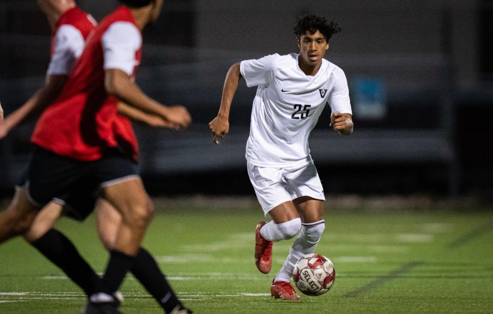 Vandegrift's Aryan Sunder dribbles the ball in the second half of the Vipers' regional quarterfinal victory on April 2. Vandegrift is one of two Austin-area boys teams that made this year's UIL state soccer tournament. In all, a record six Central Texas boys and girls teams are in the state tournament field.