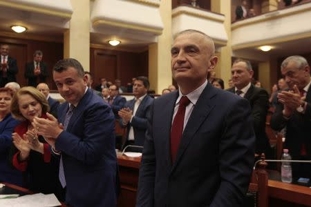 Ilir Meta (C), newly elected President of Albania receives applause in the parliament in Tirana, Albania, April 28, 2017. REUTERS/Florion Goga