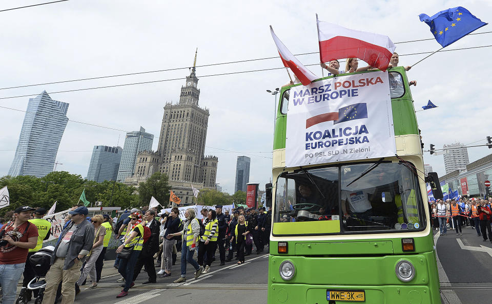 Thousands of Poles with pro-European banners march to celebrate Poland's 15 years in the EU and stressing the nation's attachment to the 28-member bloc ahead of May 26 key elections to the European Parliament, in Warsaw, Poland, Saturday, May 18, 2019.(AP Photo/Czarek Sokolowski)