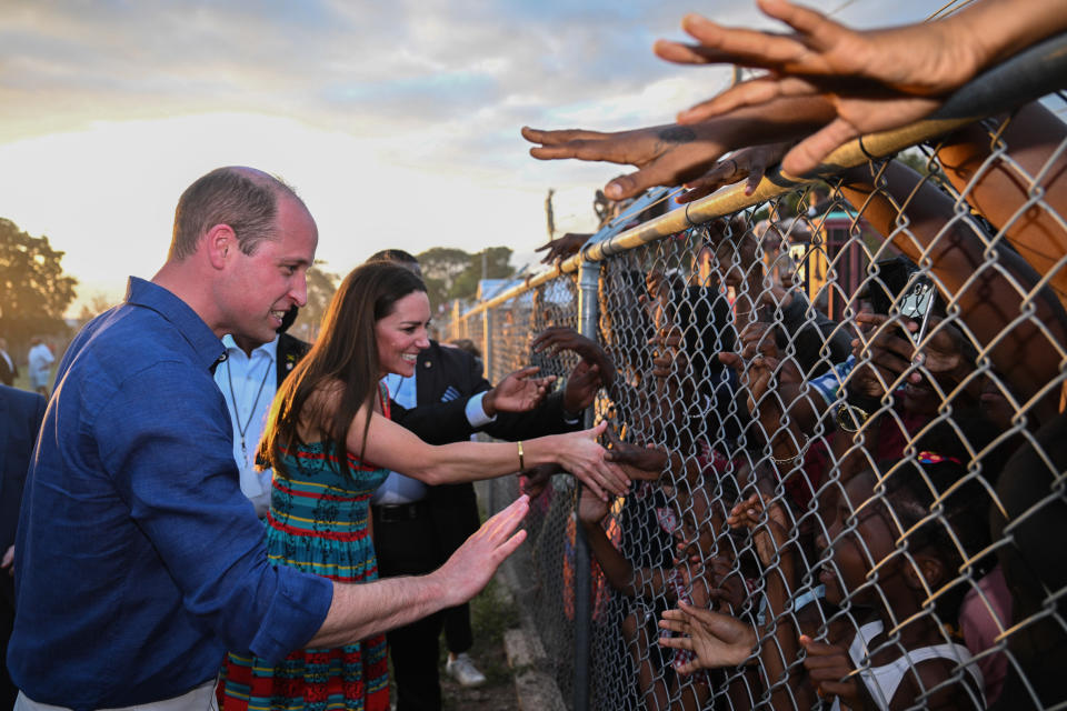 KINGSTON, JAMAICA – MARCH 22: (UK OUT FOR 28 DAYS) Catherine, Duchess of Cambridge and Prince William, Duke of Cambridge visit Trench Town, the birthplace of reggae music, on day four of the Platinum Jubilee Royal Tour of the Caribbean on March 22, 2022 in Kingston, Jamaica. The Duke and Duchess of Cambridge are visiting Belize, Jamaica, and The Bahamas on their week-long tour.  (Photo by Pool/Samir Hussein/WireImage)