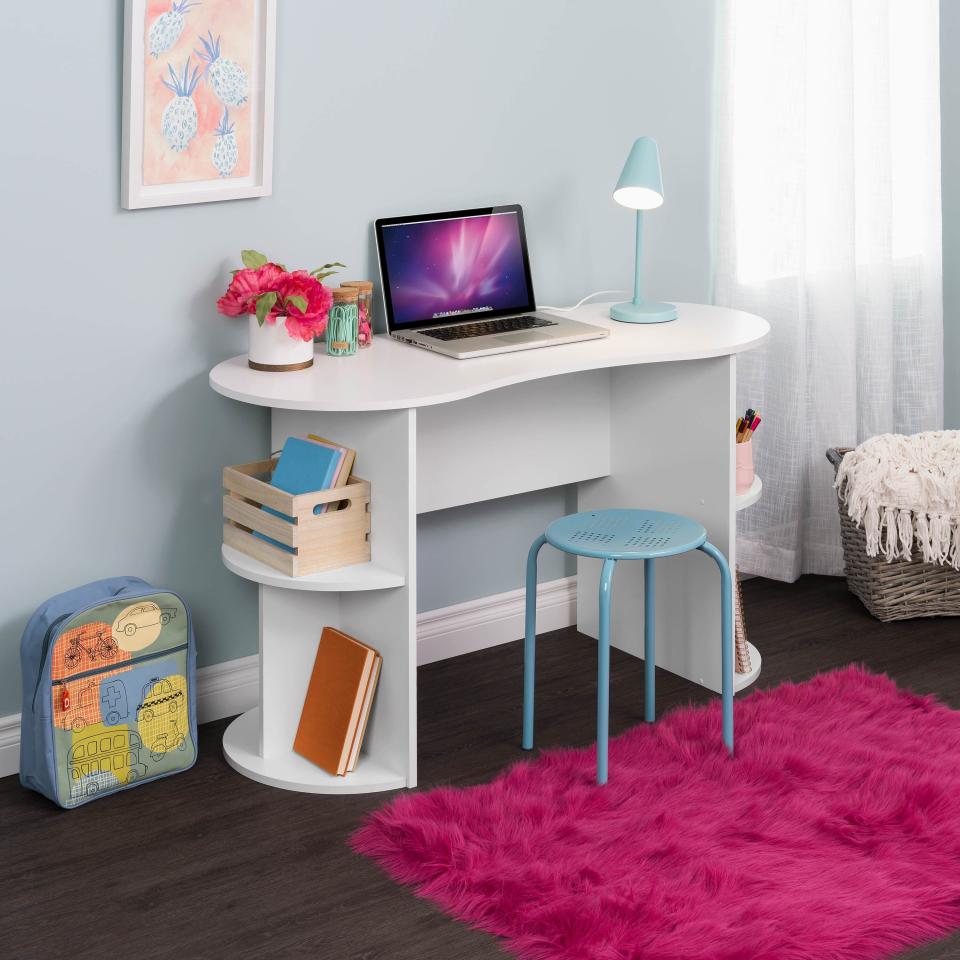 This desk has a modern design and features four shelves on the sides so kiddos can easily reach their books and notebooks. It has enough space to type away on a small laptop. <a href="https://fave.co/32L0cLq" target="_blank" rel="noopener noreferrer">Find it for $103 at Walmart</a>.