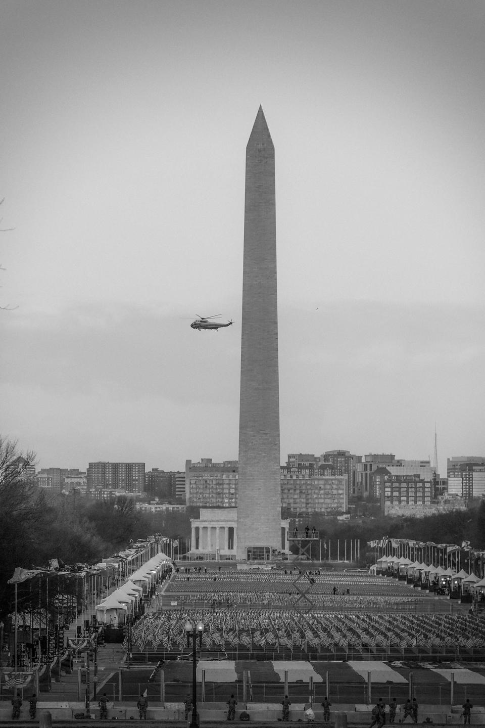 Marine One circles the National Mall carrying Donald Trump as he departs the White House ahead of the inauguration.<span class="copyright">Philip Montgomery for TIME</span>