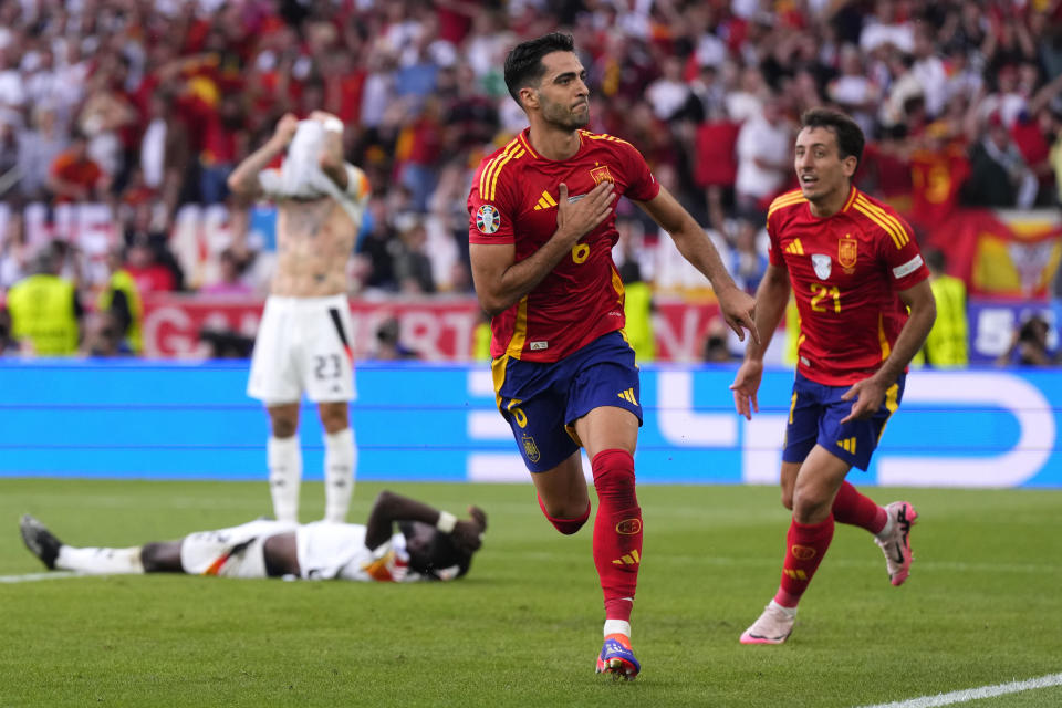 Spain's Mikel Merino celebrates after scoring his sides second goal during a quarter final match between Germany and Spain at the Euro 2024 soccer tournament in Stuttgart, Germany, Friday, July 5, 2024. (AP Photo/Manu Fernandez)