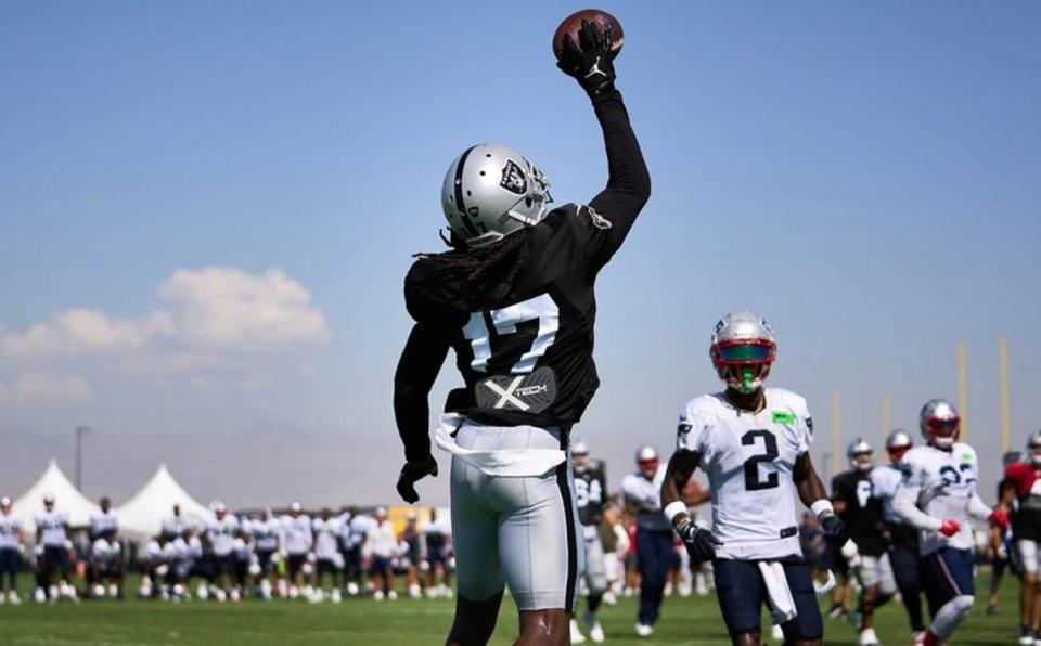 Las Vegas Raiders wide receiver Davante Adams makes a one-handed catch during a joint practice with the New England Patriots on Tuesday, Aug. 23, 2022.