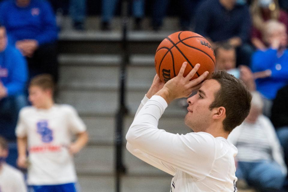 Evansville Day School’s Tyler Myers (10) warms up ahead of the Eagles game against the South Spencer Rebels in Evansville, Ind., Tuesday evening, Jan. 11, 2022. 