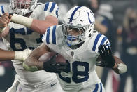 FILE - Indianapolis Colts running back Jonathan Taylor (28) plays against the Arizona Cardinals during an NFL football game on Dec. 25, 2021, in Glendale, Ariz. Taylor was named to The Associated Press 2021 NFL All-Pro Team, announced Friday, Jan. 14, 2022.(AP Photo/Darryl Webb, File)