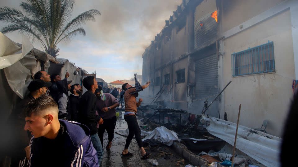 Smoke rises after an attack on an UNRWA facility in Khan Younis on January 24, where more than 10,000 civilians were taking shelter. At least 12 people were killed and another 75 injured, according to the humanitarian agency. - Ramez Habboub/Anadolu/Getty Images