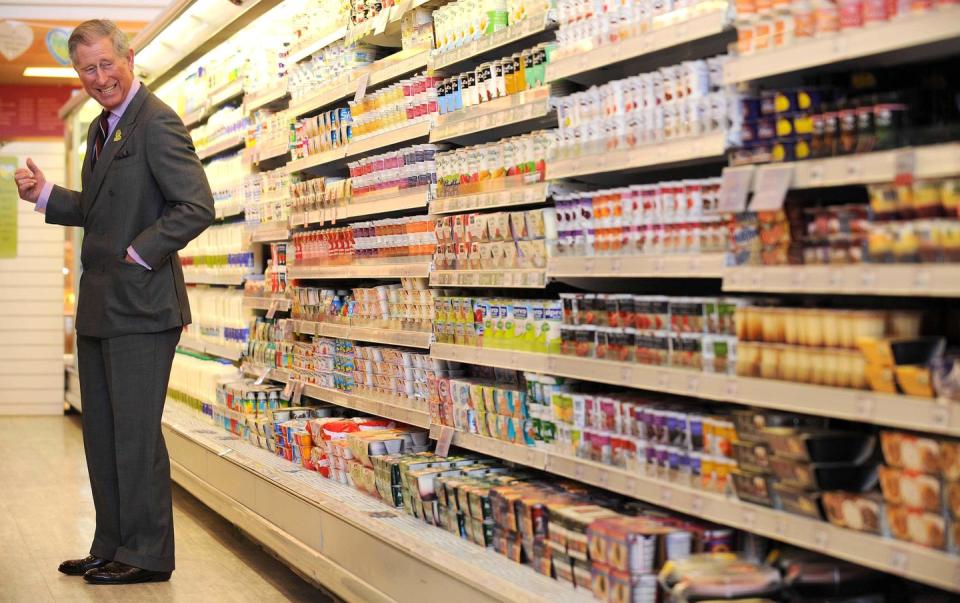 16 Photos of Queen Elizabeth, Prince Charles, and Other Royals at the Grocery Store