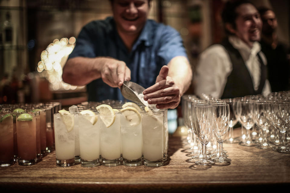 Food and drink being prepared and served at Christmas parties at Bush Hall in London.