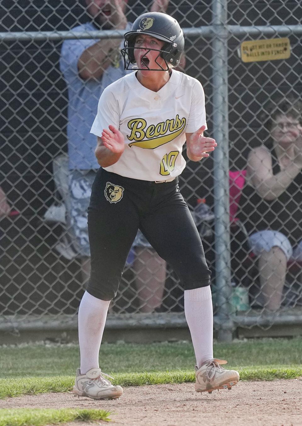 Shelbyville Golden Bears Hailey Pogue (00) yells in excitement on Tuesday, May 30, 2022, at Shelbyville High School in Shelbyville, Indiana. The Shelbyville Golden Bears defeated Whiteland for the IHSAA Class 4A softball regional championship. 