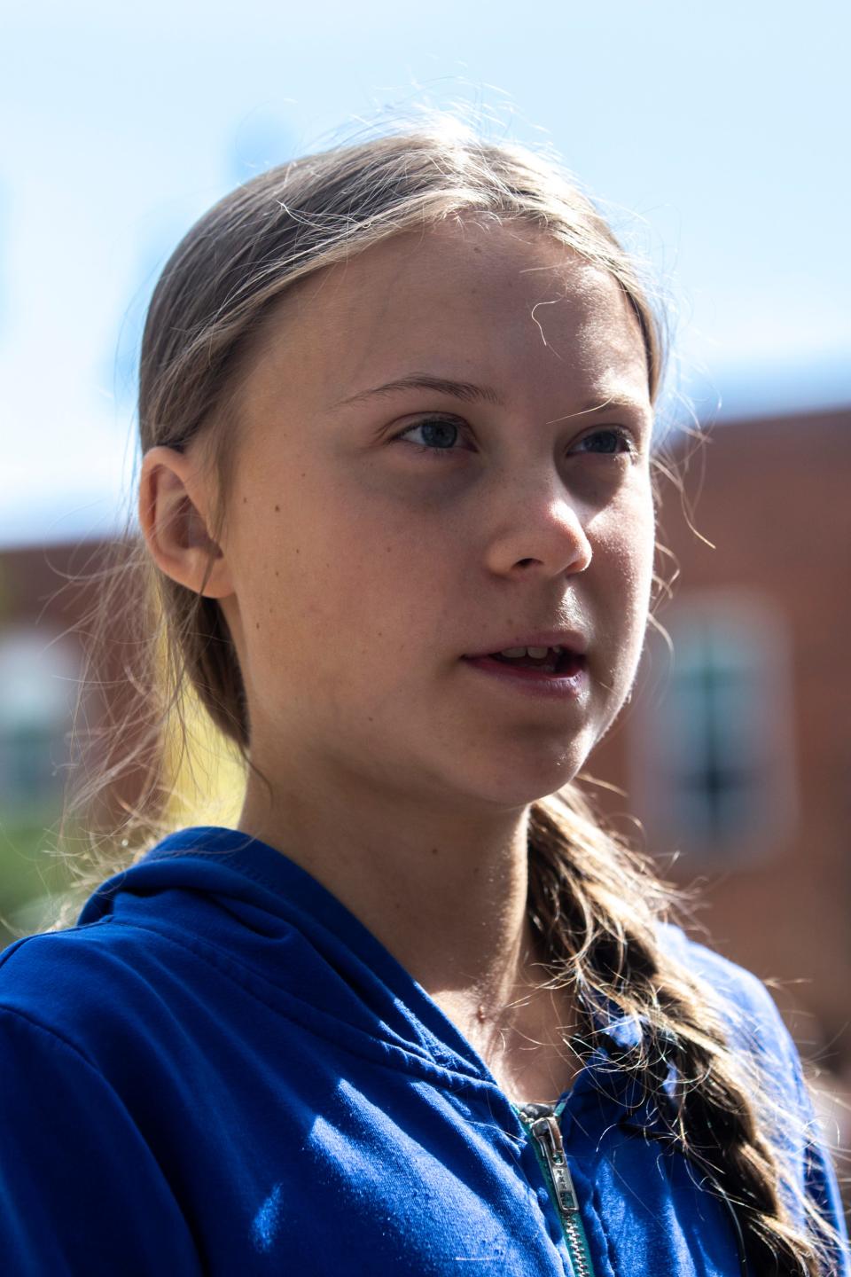 Climate activist Greta Thunberg speaks with reporters during the 