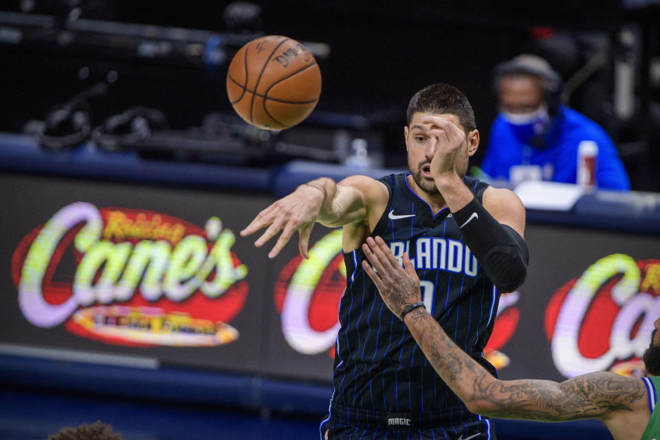 Jan 9, 2021; Dallas, Texas, USA; Orlando Magic center Nikola Vucevic (9) in action during the game between the Dallas Mavericks and the Orlando Magic at the American Airlines Center. Mandatory Credit: 