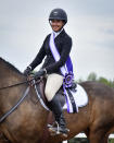 In this undated photo provided by Karie Alderman, Lauryn Gray poses for a photo at the Trillium Championships at Caledon Equestrian Park in Palgrave, Canada. One of the most candid conversations about race in sports is coming from a most unlikely of places: the show-jumping world. Gray, who has one black and one white parent wrote a blog after she was inspired by fellow equestrian Sophie Gochman. (Karie Alderman via AP)