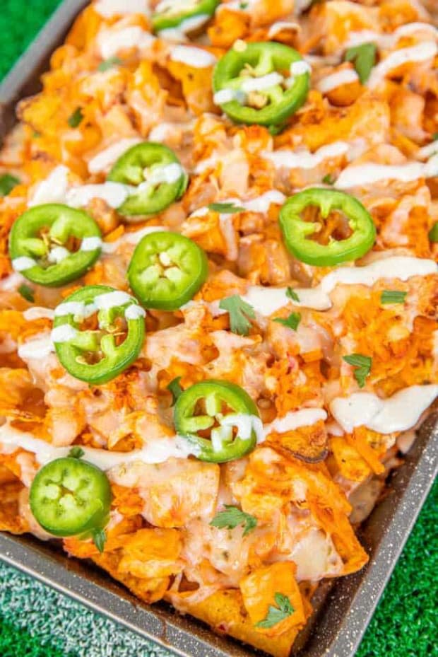 <p><a href="https://www.plainchicken.com/buffalo-chicken-nachos-football-friday/" rel="nofollow noopener" target="_blank" data-ylk="slk:Plain Chicken;elm:context_link;itc:0;sec:content-canvas" class="link ">Plain Chicken</a></p>