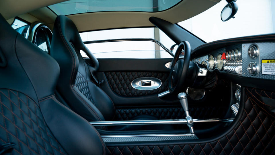 Interior touches include diamond-quilted black leather with orange contrast stitching. - Credit: Photo by Toan Trinh, courtesy of Bonhams.