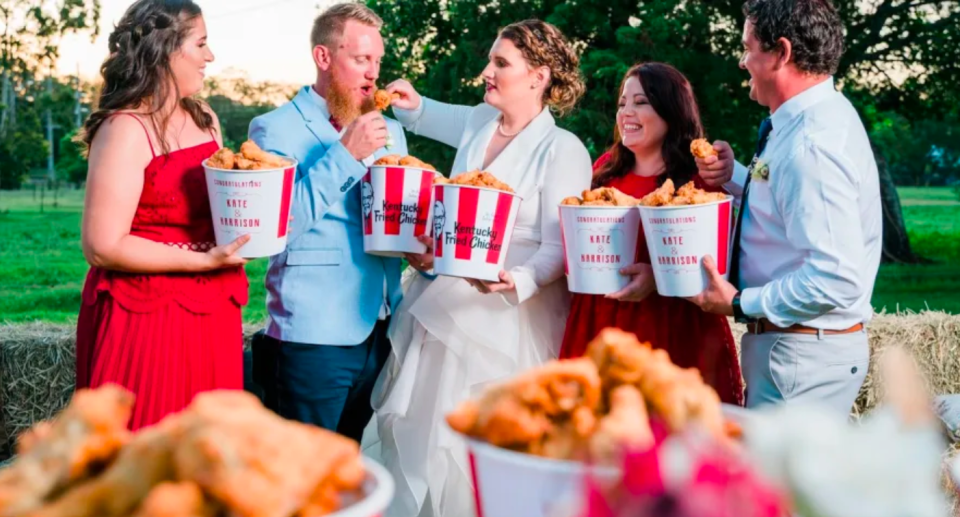 Wedding party eating KFC from buckets