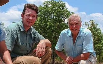 Adam Britton, with Sir David Attenborough filming Life In Cold Blood for the BBC in 2008 - British zoologist sentenced to 10 years in prison for raping and killing dogs in Australia