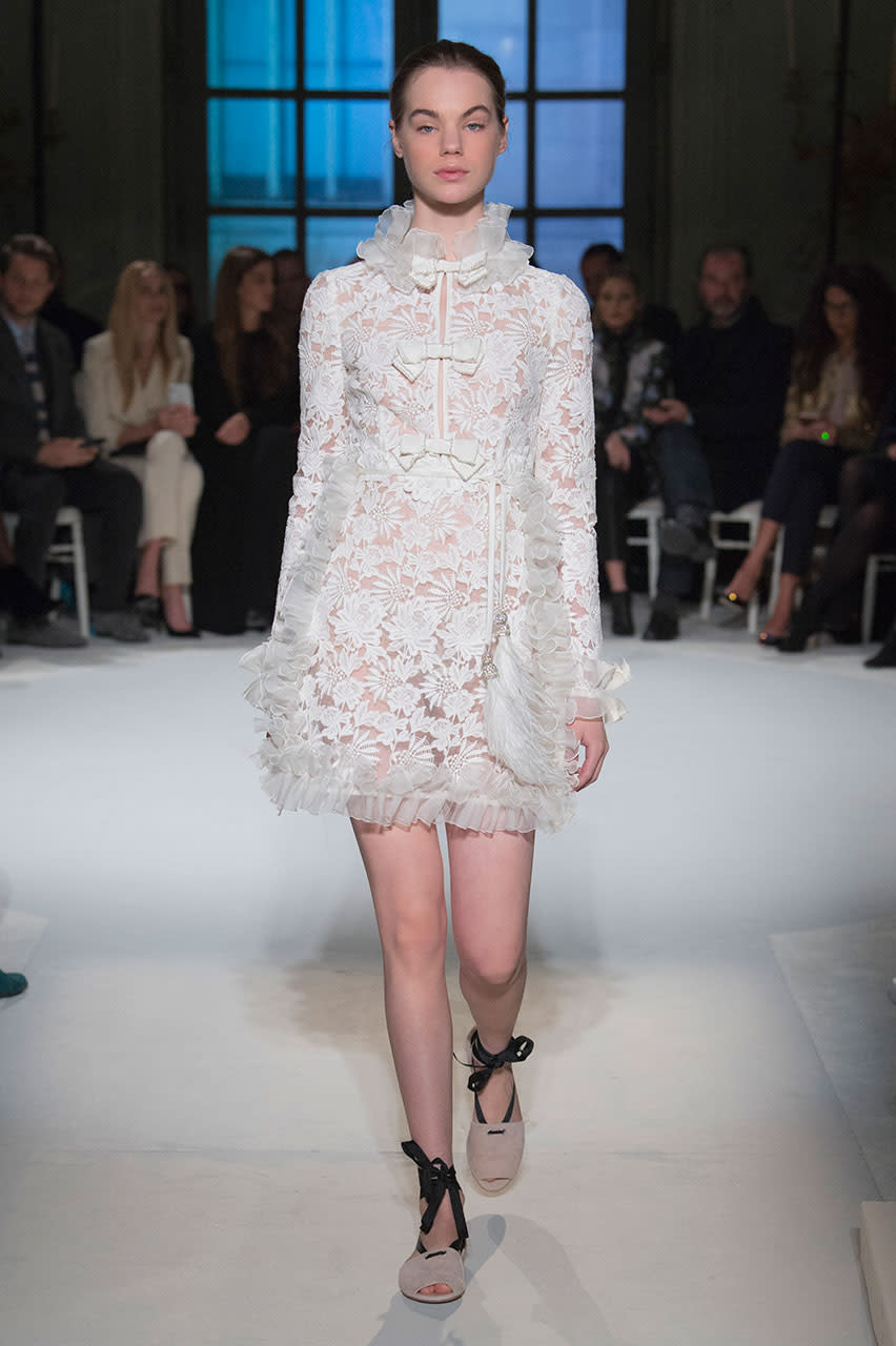 <p>This dress is a nice contrast to the big gowns with embellishment from Giambattista Valli. The short white lace dress with just the right amount of ruffles is enough to make every under-30 fashion fan scream, shout, or maybe just work hard to get the money to buy it. (Photo: Getty Images) </p>