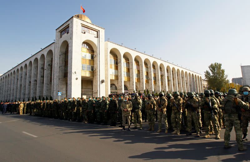 Members of Kyrgyz armed forces stand in formation in Ala-Too Square in Bishkek