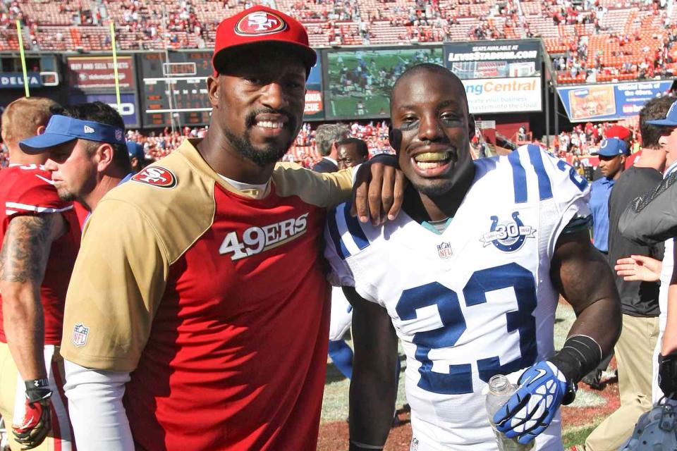 Michael Zagaris/San Francisco 49ers/Getty  (L-R) Vernon and Vontae Davis in 2013