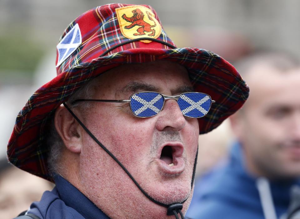 A supporter of the "Yes" campaign reacts in George Square after the referendum on Scottish independence in Glasgow