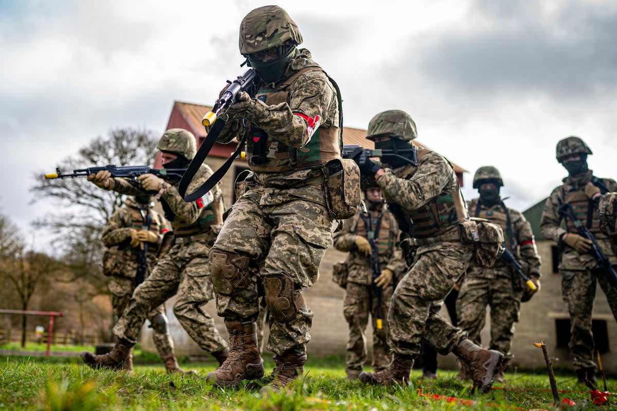 Members of the UK armed forces training Ukrainian military recruits at a facility in Wiltshire (Ben Birchall/PA Wire)