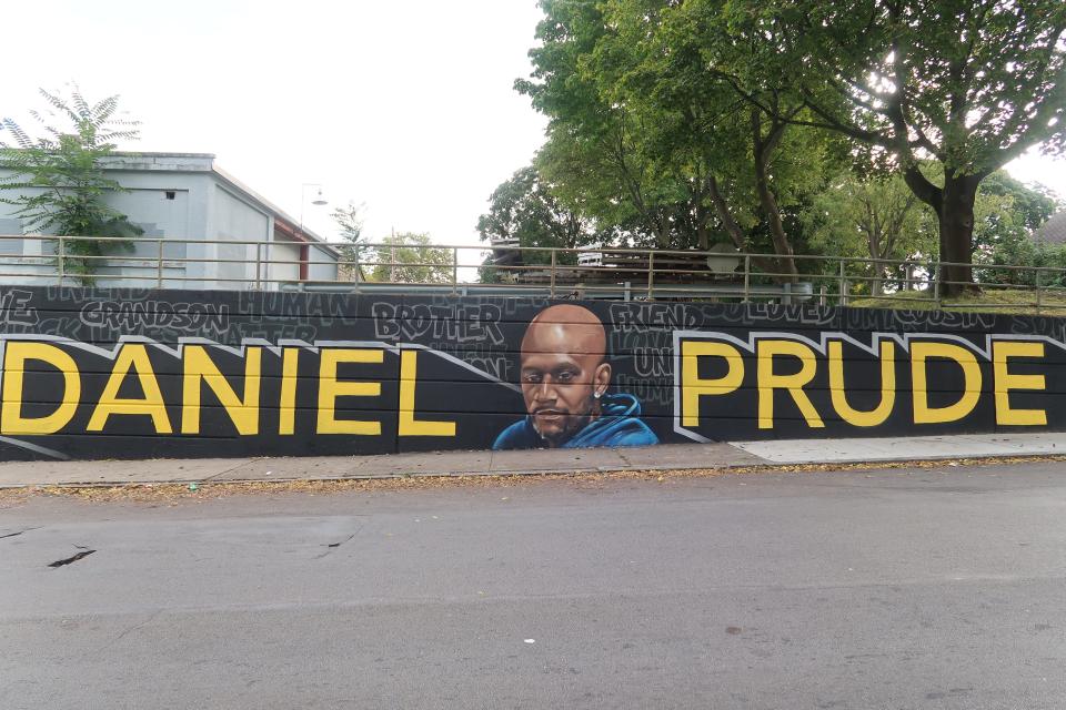 A spray-paint portrait of Daniel Prude, 41, who died while in police custody in Rochester, N.Y., in March 2020. The mural was completed in October 2020 near where Prude's brother, Joe Prude, lives.