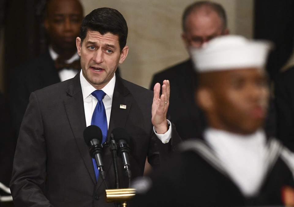 15) Paul Ryan delivers an address at the service.