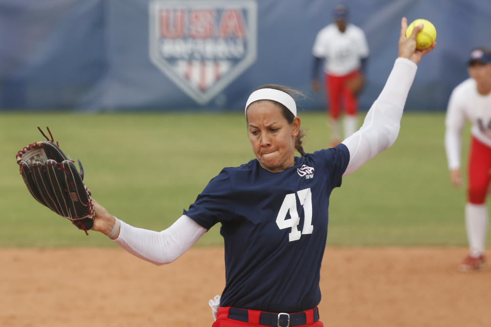 FILE - In this Oct. 5, 2019, file photo, Cat Osterman pitches during a simulated game at the USA Softball Women's Olympic Team Selection Trials in Oklahoma City. Osterman is the first Athletes Unlimited softball champion. The league crowned her its individual champion on Monday, Sept. 29, 2020, based on points scored in games played during a five-week season played in a bubble at a sports complex in Rosemont, Ill. The 37-year-old left-hander compiled 2,408 points, followed by Jessica Warren, Victoria Hayward and Erika Piancastelli. (AP Photo/Sue Ogrocki, File)