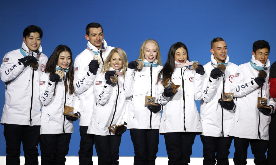 <p>Team figure skating bronze medalists from the United States pose during their medals ceremony at the 2018 Winter Olympics in Pyeongchang, South Korea, Monday, Feb. 12, 2018. (AP Photo/Jae C. Hong) </p>