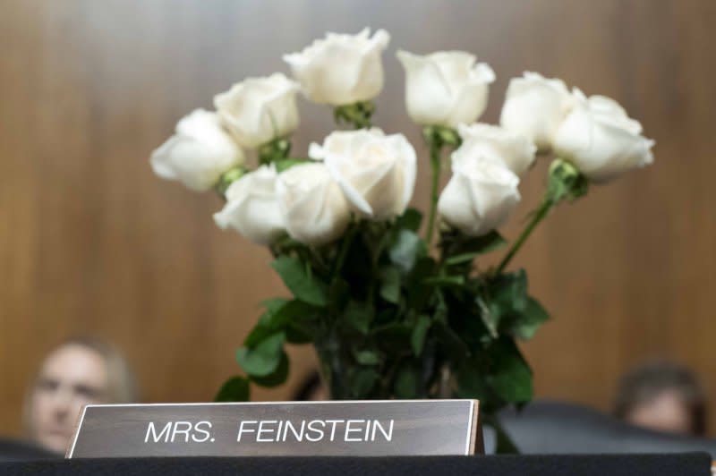 The desk of late Sen. Dianne Feinstein, D-Calif., is draped in black and set with white roses as the Senate Judiciary Committee holds a hearing on federal judge nominations at the U.S. Capitol in Washington, D.C., on Wednesday. Photo by Bonnie Cash/UPI