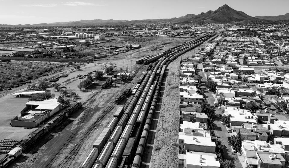 Ferromex trains sit idle in private rail yard in Chihuahua City, Mexico. Mexican federal, state, and municipal officers, joined by immigration officers, removed migrants from trains on Sept. 23, 2023. Eventually, the migrants were forced to leave the rail yard and resumed their 240-mile journey north to Juárez on foot.