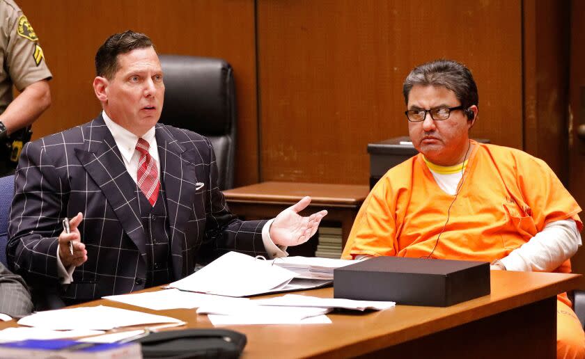 Naason Joaquin Garcia (R), the leader of a Mexico-based La Luz del Mundo evangelical church, along with his defense attorney Ken Rosenfeld (L), attend a bail review hearing at Los Angeles Superior Court on July 15.