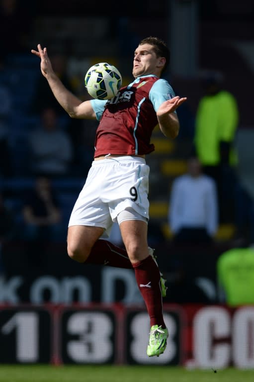 Burnley's striker Sam Vokes controls the ball during the English Premier League football match between Burnley and Tottenham Hotspur at Turf Moor in Burnley, England, on April 5, 2015