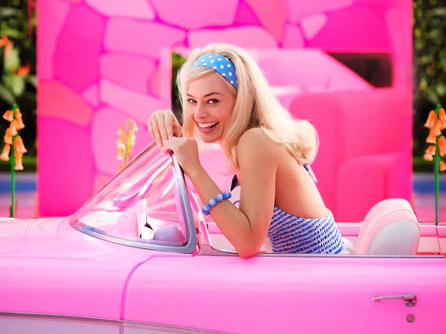 Margot Robbie as Barbie