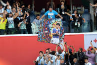 <p>Diego Maradona holds a banner of himself in the stands before the FIFA World Cup Group D match at Saint Petersburg Stadium. (Photo by Owen Humphreys/PA Images via Getty Images) </p>