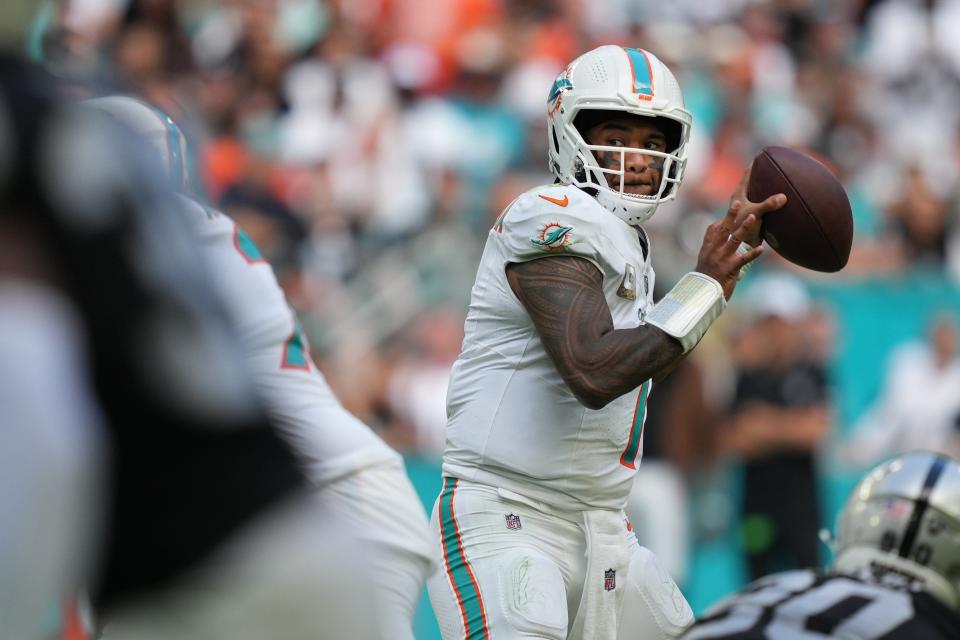 Miami Dolphins quarterback Tua Tagovailoa (1) drops back to pass during the second half of an NFL game against the Las Vegas Raiders at Hard Rock Stadium in Miami Gardens, Nov. 19, 2023.