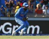 India's Ravindra Jadeja drops a catch off West Indies batsman Darren Sammy during their Cricket World Cup match in Perth, March 6, 2015. REUTERS/David Gray