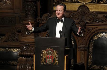 Britain's Prime Minister David Cameron speaks during the traditional historic banquet "Matthiae-Mahlzeit" (St. Matthew's Day Banquet) at the town hall in Hamburg February 12, 2016. REUTERS/Morris Mac Matzen