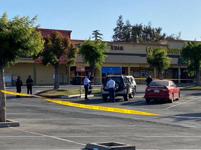 Police investigating a shooting death in west Fresno May 18, 2022.