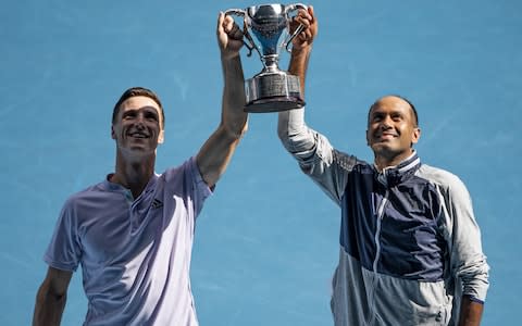 Joe Salisbury and Rajeev Ram celebrate their men's doubles triumph - Credit: Getty Images