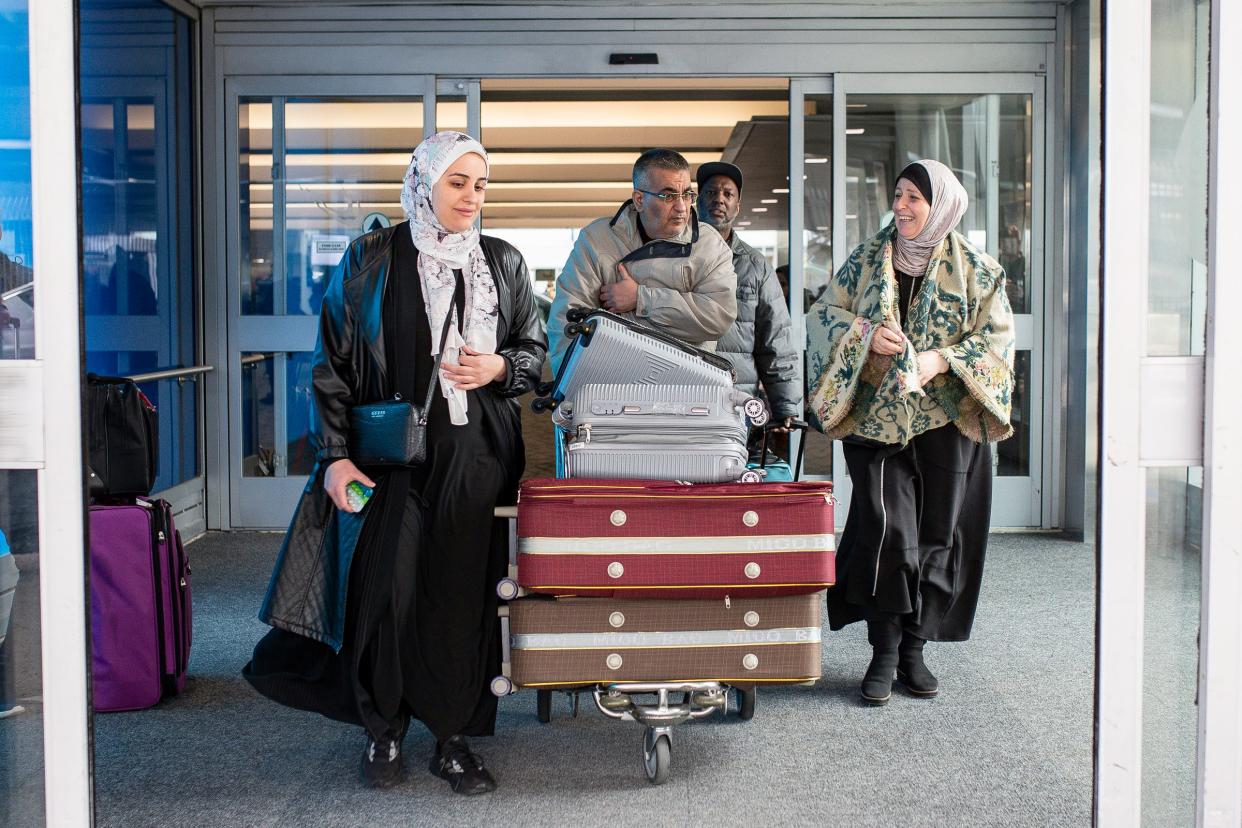 Sarah Shannan walks out of Detroit Metro Airport with her parents, Ayman and Mona Shannan, after they arrived from Egypt on Wednesday, March 27, 2024.